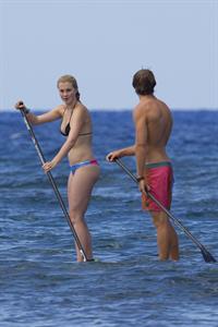 Ireland Baldwin goes paddle-boarding in Hawaii with her boyfriend Slater Trout May 26, 2013 