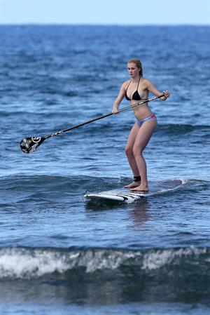 Ireland Baldwin goes paddle-boarding in Hawaii with her boyfriend Slater Trout May 26, 2013 