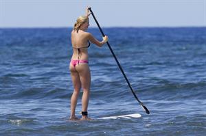 Ireland Baldwin goes paddle-boarding in Hawaii with her boyfriend Slater Trout May 26, 2013 