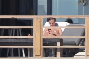 Cara Delevingne Topless Pictures Cara Delevingne topless on a balcony