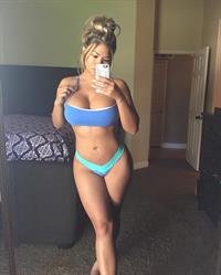 Jojo Babie in a bikini taking a selfie