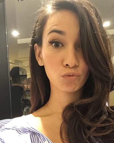 Celina Jade taking a selfie