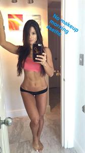 Michelle Lewin in a bikini taking a selfie