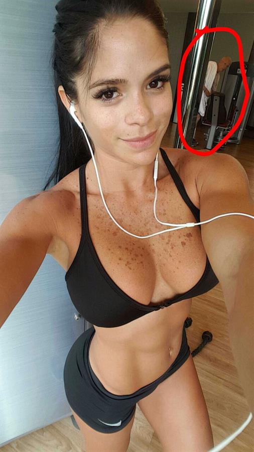 Michelle Lewin in a bikini taking a selfie