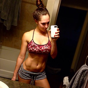 Hope Beel in a bikini taking a selfie