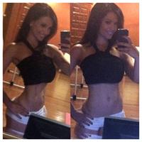 Denise Milani taking a selfie