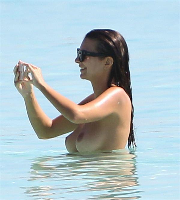 Emily Ratajkowski topless @ the beach
