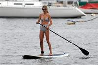 Taylor Swift paddleboarding in Westerly, Massachusetts 7/28/13 