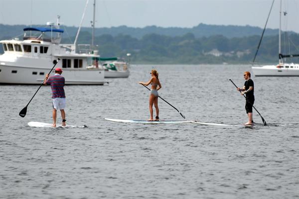 Taylor Swift paddleboarding in Westerly, Massachusetts 7/28/13 