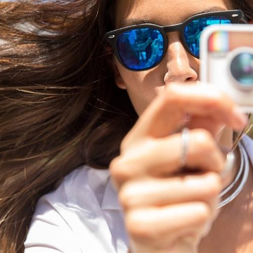 Lily Aldridge taking a selfie