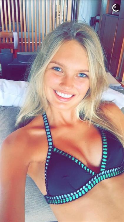 Romee Strijd in a bikini taking a selfie