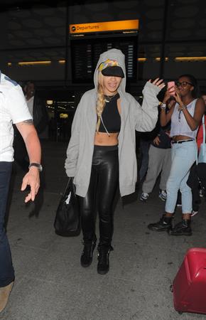 Rita Ora catches a flight at Heathrow Airport in London (27.06.2013) 