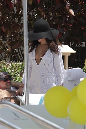Selena Gomez in bikini by a hotel pool in Miami 5/11/13 