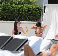 Selena Gomez in bikini by a hotel pool in Miami 5/11/13 