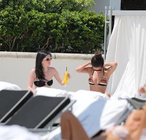 Selena Gomez in bikini by a hotel pool in Miami 5/11/13 