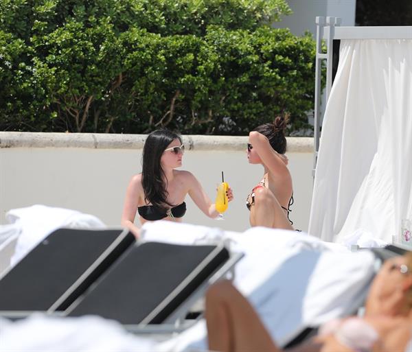 Selena Gomez in bikini by a hotel pool in Miami 5/11/13 