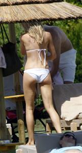 Abigail Clancy bikini candids Sardinia Italy on June 9, 2011 