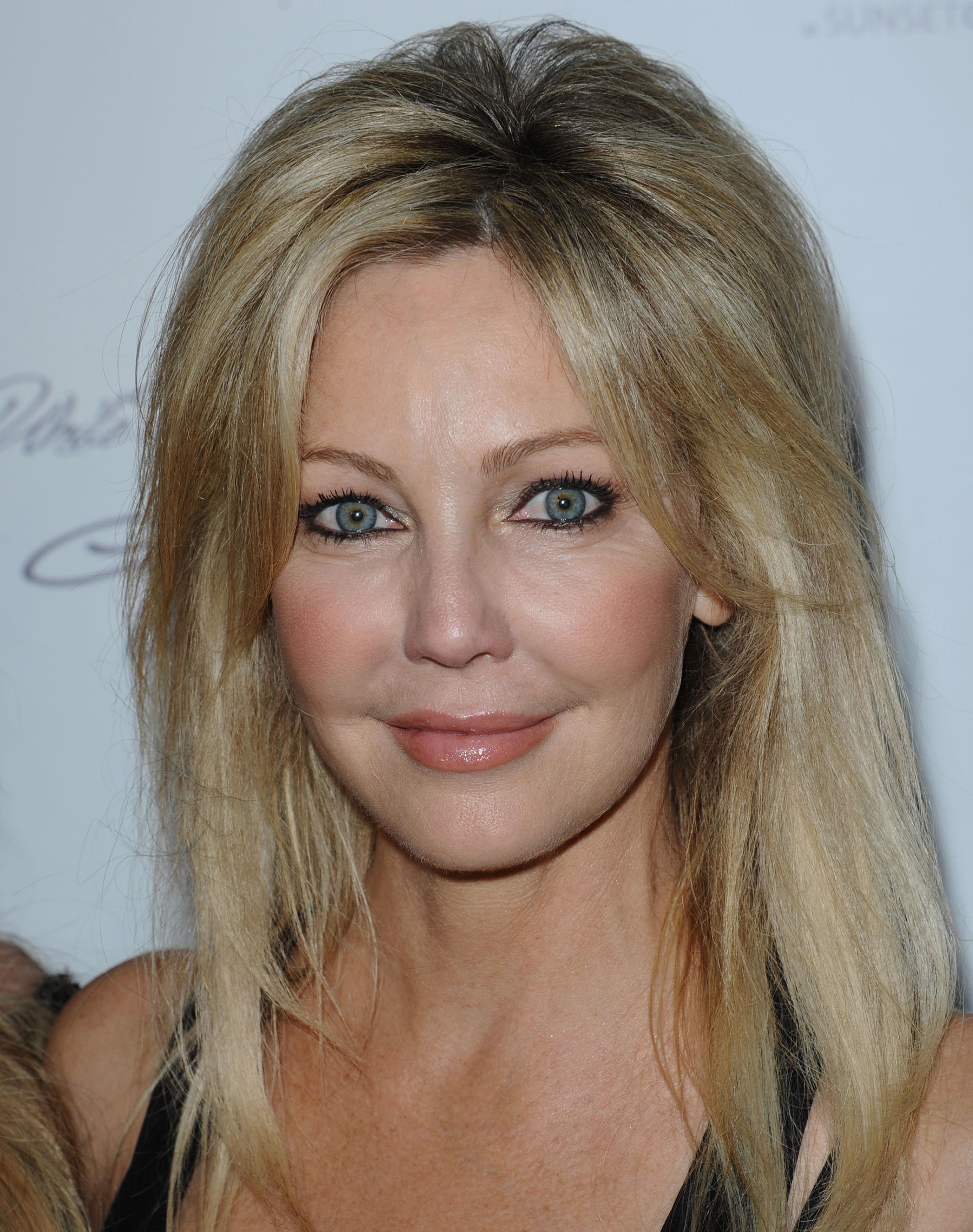 Heather Locklear Pictures. Hotness Rating = 8.30/10