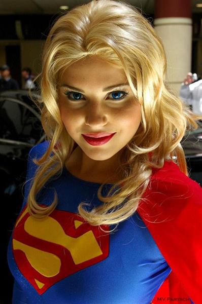 Girls dressed up as Supergirl
