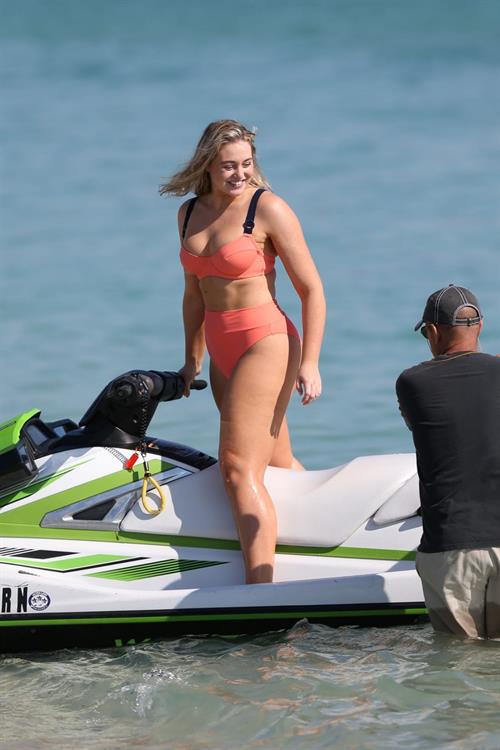 Iskra Lawrence in a swimsuit on Miami beach doing a photoshoot for Aerie on 11/26/2018