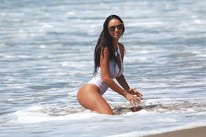 Charlie Riina in a beach photoshoot for 128 Water in Santa Monica on  11/25/2018