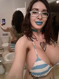 Ariane Saint Amour in a bikini taking a selfie