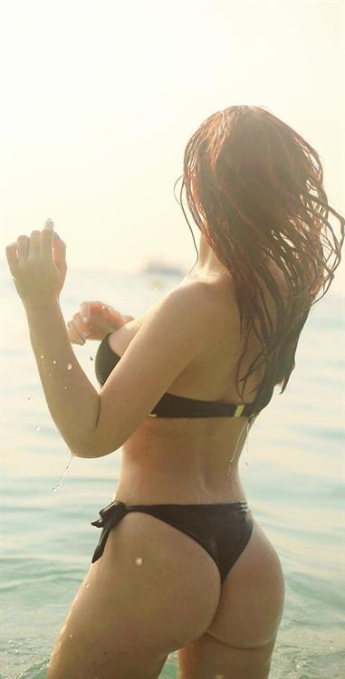 Irina Pirozhnikova in a bikini - ass