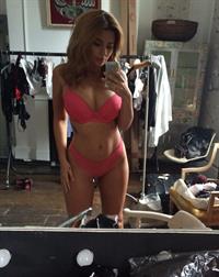 Holly Peers in lingerie taking a selfie