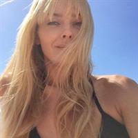 Izabella Scorupco taking a selfie
