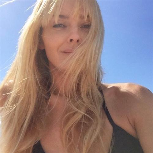 Izabella Scorupco taking a selfie