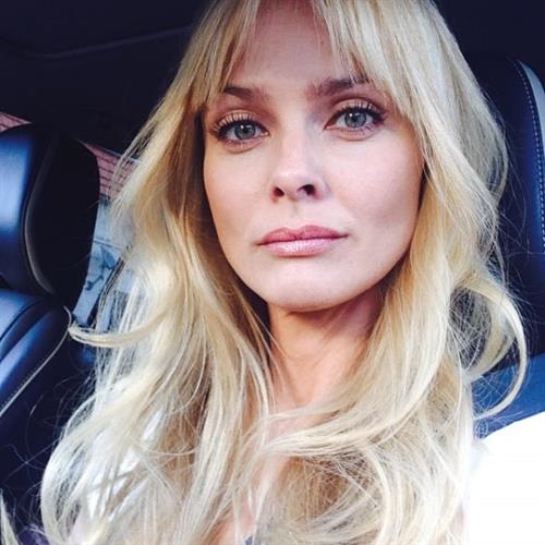 Izabella Scorupco taking a selfie