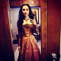 Adelaide Kane taking a selfie