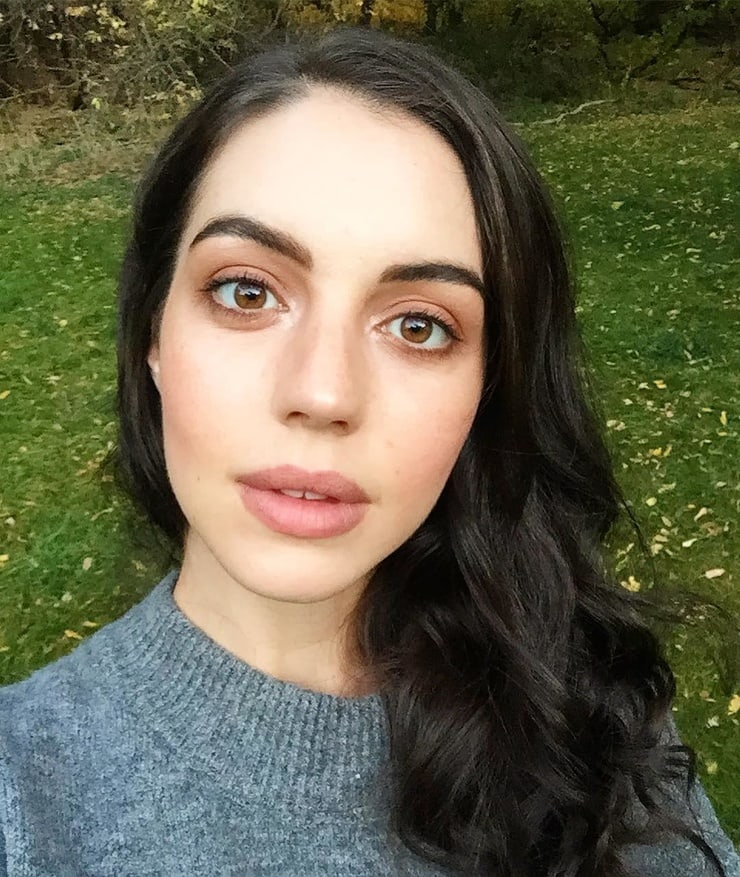 Adelaide Kane taking a selfie