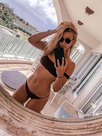Sabina Gadecki in a bikini taking a selfie