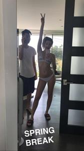 Anonymous in a bikini taking a selfie