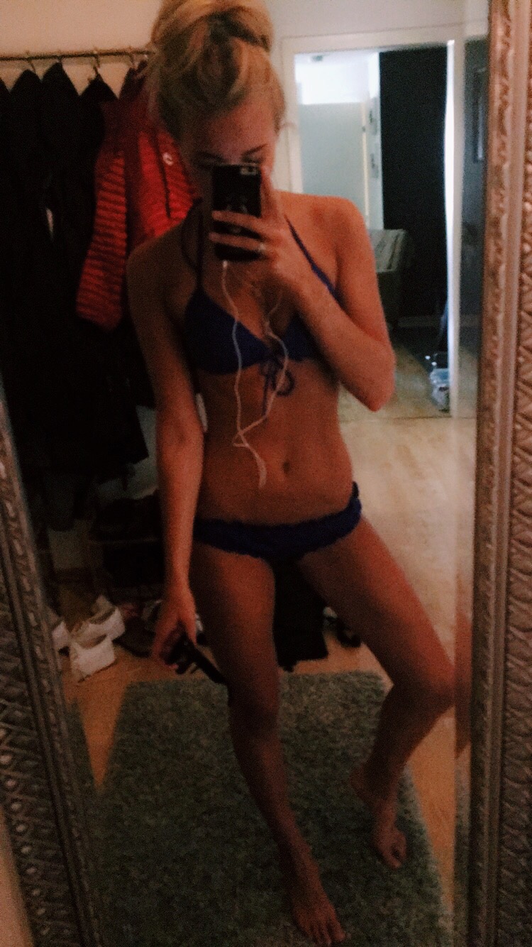 Anonymous in a bikini taking a selfie