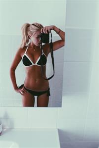 Anonymous in a bikini taking a selfie