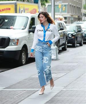 Bella Thorne braless tits seen by paparazzi showing her pierced nipple dressed all in Chanel.






