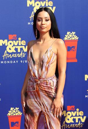 Alexa Demie braless boobs in a revealing dress on the red carpet at the 2019 MTV Movie and TV Awards.






















