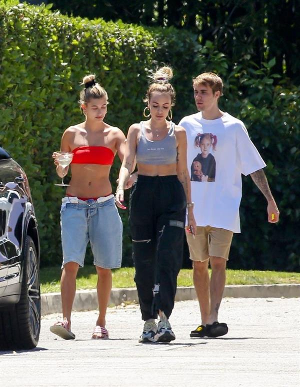 Hailey Baldwin Bieber in a sexy red bikini out with Justin Bieber seen by paparazzi.




