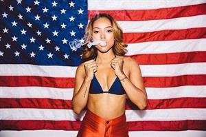 Karrueche Tran sexy in a bikini top showing some nice cleavage for the 4th of July.



