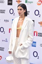 Dua Lipa looking hot in a sexy revealing top seen by paparazzi.





