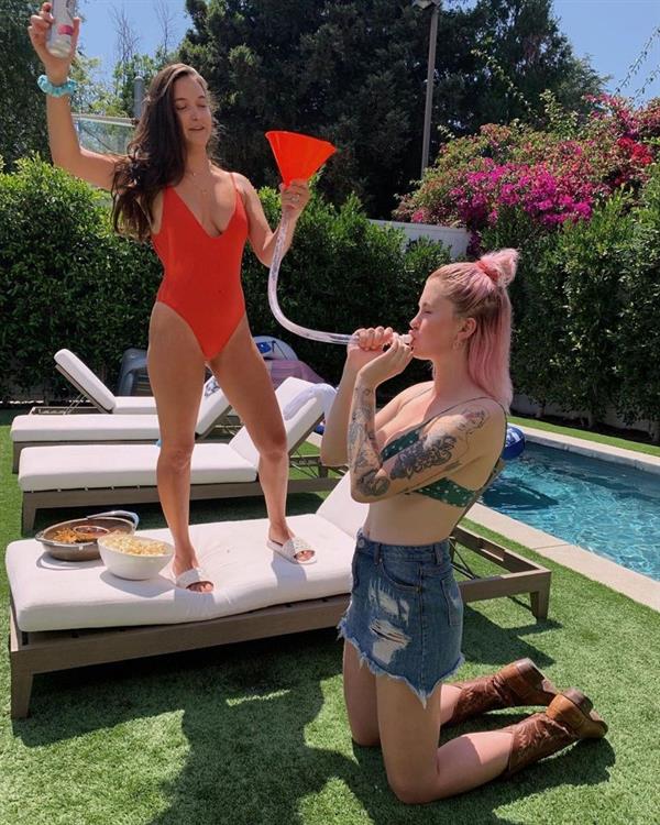 Ireland Baldwin sexy in a bikini top seen by paparazzi showing some nice cleavage.








