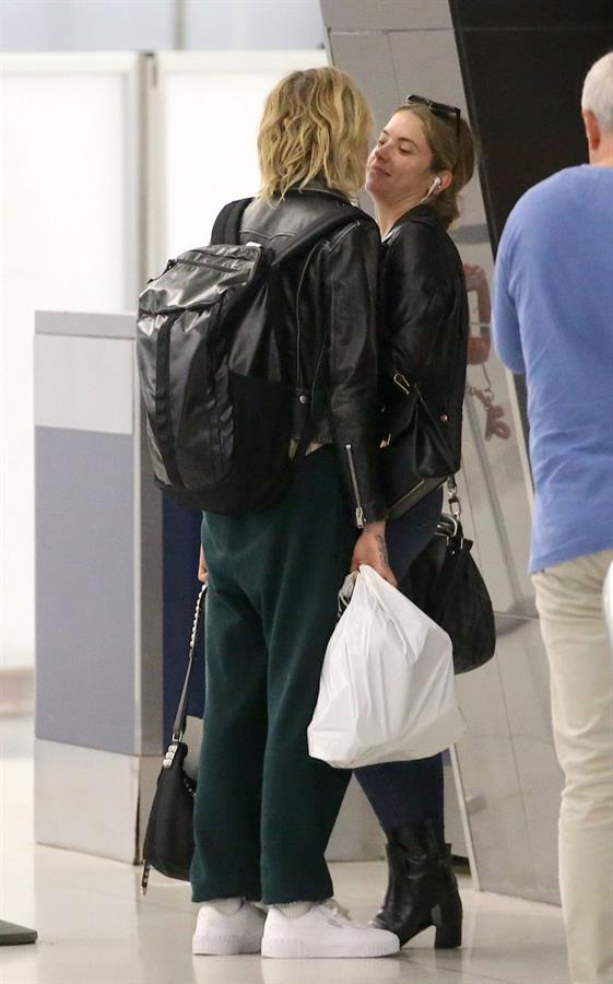 Cara Delevingne and Ashley Benson kissing at the airport.






















