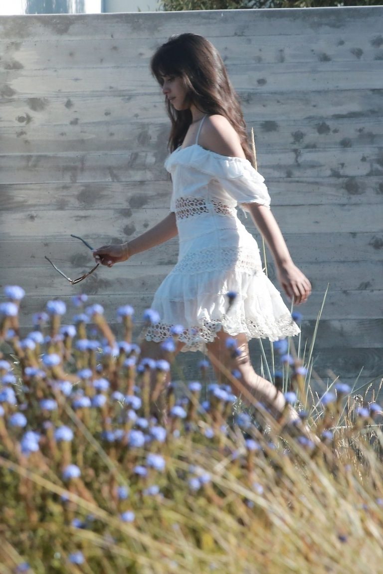Camila Cabello Pictures Camila Cabello sexy ass in a white dress seen with Shawn Mendes by paparazzi.