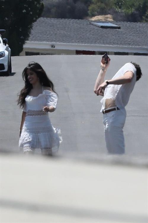Camila Cabello Pictures Camila Cabello sexy ass in a white dress seen with Shawn Mendes by paparazzi.