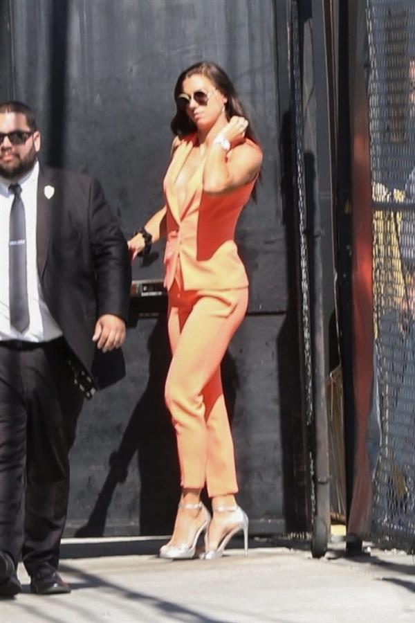 Alex Morgan braless and sexy in a orange jacket seen by paparazzi.








