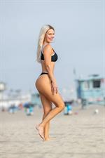 WWE Diva Lana or CJ Perry sexy boobs and ass in a bikini seen at the beach by paparazzi.










