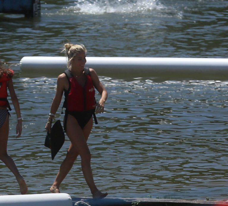 Elsa Pataky Bikini Pictures Elsa Pataky sexy ass and cleavage in a swimsuit seen by paparazzi with Chris Hemsworth.