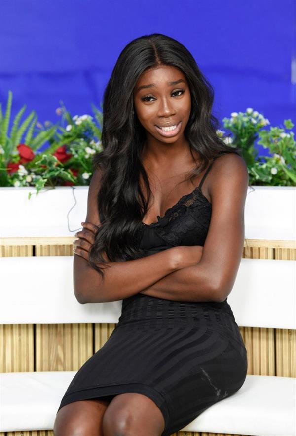 Yewande Biala from Love Island sexy in a tight black dress on  I Saw It First HQ .















